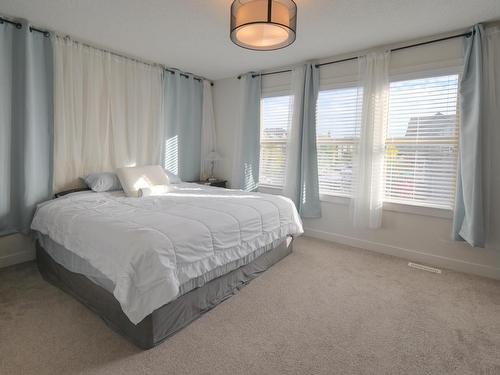 102 Gilmore Way, Spruce Grove, AB - Indoor Photo Showing Bedroom