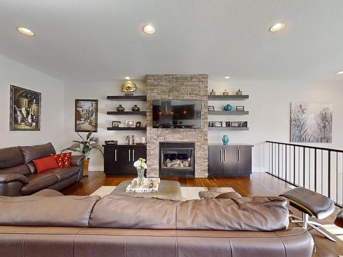 10919-175 Avenue, Edmonton, AB - Indoor Photo Showing Living Room With Fireplace