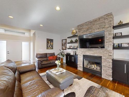 10919-175 Avenue, Edmonton, AB - Indoor Photo Showing Living Room With Fireplace