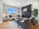 119 Brickyard Drive, Stony Plain, AB  - Indoor Photo Showing Living Room With Fireplace 