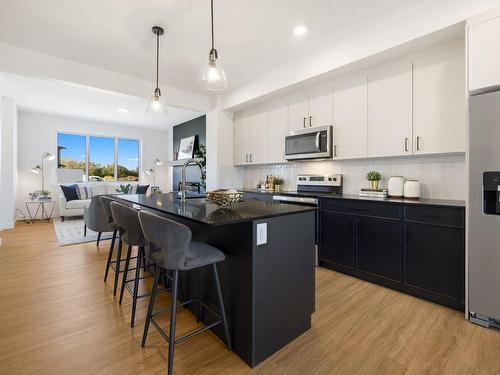 10241 92A Avenue, Morinville, AB - Indoor Photo Showing Kitchen With Upgraded Kitchen