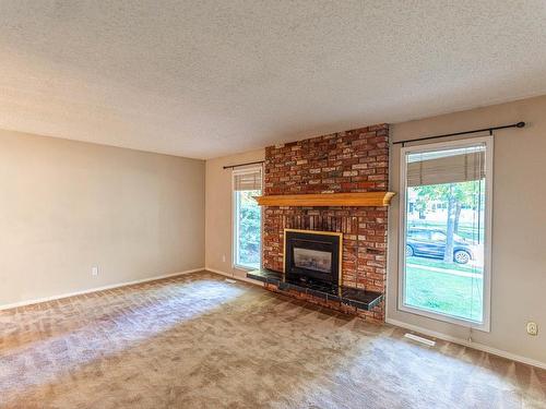 47 Linwood Crescent, St. Albert, AB - Indoor Photo Showing Living Room With Fireplace