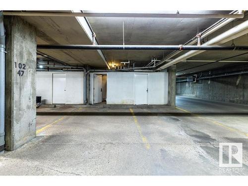 218 17151 94A Avenue, Edmonton, AB - Indoor Photo Showing Garage