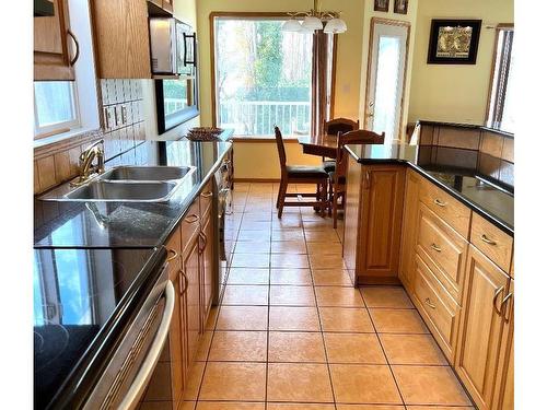 16002 67A Street, Edmonton, AB - Indoor Photo Showing Kitchen With Double Sink