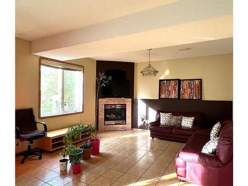 16002 67A Street, Edmonton, AB - Indoor Photo Showing Living Room With Fireplace