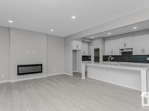 7324 182 Avenue, Edmonton, AB - Indoor Photo Showing Kitchen With Fireplace