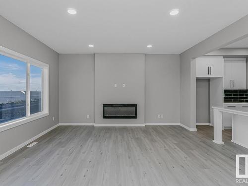 7324 182 Avenue, Edmonton, AB - Indoor Photo Showing Other Room With Fireplace