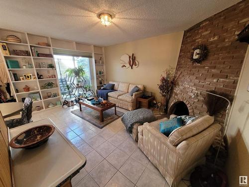 10 Garcia Place, St. Albert, AB - Indoor Photo Showing Living Room With Fireplace