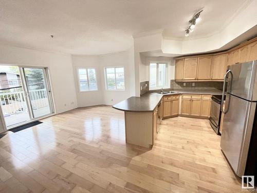 229 8528 82 Avenue, Edmonton, AB - Indoor Photo Showing Kitchen With Double Sink