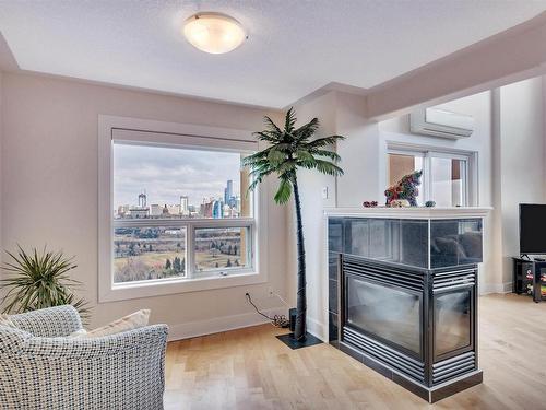 504 10855 Saskatchewan Drive, Edmonton, AB - Indoor Photo Showing Other Room With Fireplace