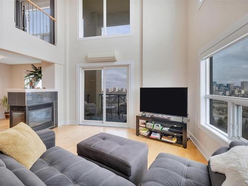 504 10855 Saskatchewan Drive, Edmonton, AB - Indoor Photo Showing Living Room With Fireplace