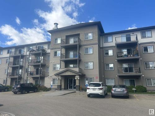 235 301 Clareview Station Drive, Edmonton, AB - Outdoor With Balcony With Facade