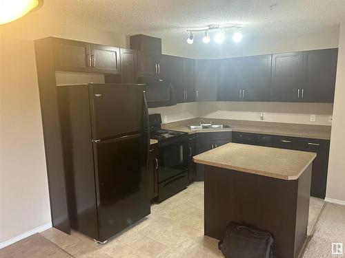 235 301 Clareview Station Drive, Edmonton, AB - Indoor Photo Showing Kitchen With Double Sink