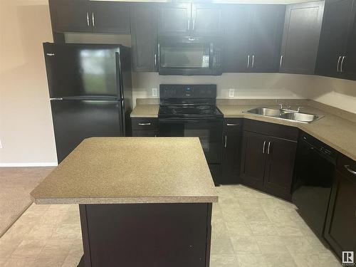 235 301 Clareview Station Drive, Edmonton, AB - Indoor Photo Showing Kitchen With Double Sink