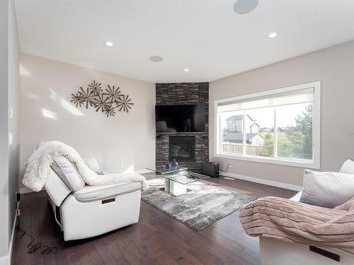 99 Hilldowns Dr, Spruce Grove, AB - Indoor Photo Showing Living Room With Fireplace