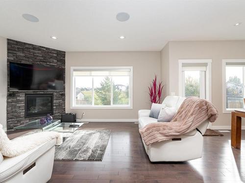 99 Hilldowns Dr, Spruce Grove, AB - Indoor Photo Showing Living Room With Fireplace