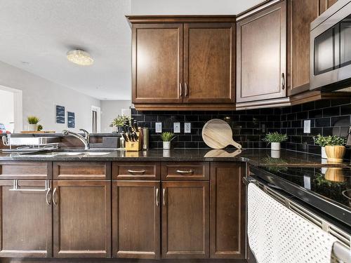 105 7907 109 Street, Edmonton, AB - Indoor Photo Showing Kitchen With Double Sink