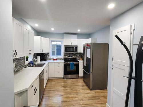 8612 104 Street, Edmonton, AB - Indoor Photo Showing Kitchen With Stainless Steel Kitchen With Double Sink