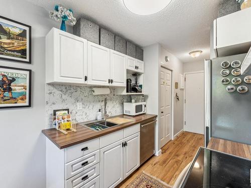 18 11219 103A Avenue, Edmonton, AB - Indoor Photo Showing Kitchen With Double Sink