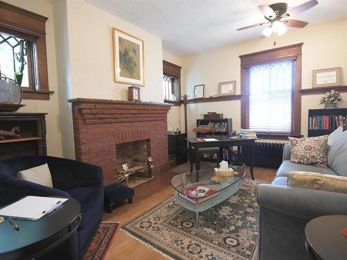 10417 Saskatchewan Drive, Edmonton, AB - Indoor Photo Showing Living Room With Fireplace