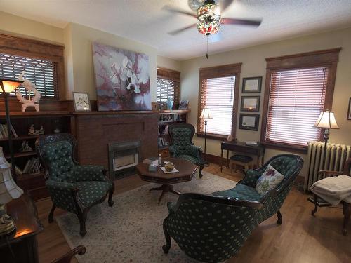 10417 Saskatchewan Drive, Edmonton, AB - Indoor Photo Showing Living Room With Fireplace