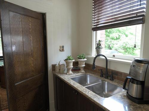 10417 Saskatchewan Drive, Edmonton, AB - Indoor Photo Showing Kitchen With Double Sink