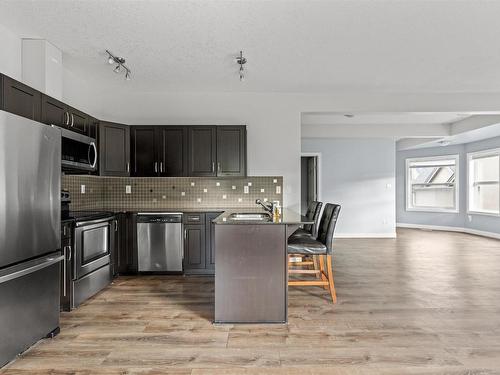 18 1720 Garnett Point Nw, Edmonton, AB - Indoor Photo Showing Kitchen With Double Sink