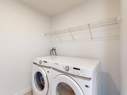 3447 Craig Landing, Edmonton, AB - Indoor Photo Showing Laundry Room