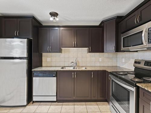 6 10710 84 Avenue, Edmonton, AB - Indoor Photo Showing Kitchen With Double Sink