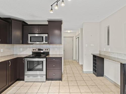 6 10710 84 Avenue, Edmonton, AB - Indoor Photo Showing Kitchen With Stainless Steel Kitchen