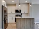 338 Genesis Villa(S), Stony Plain, AB  - Indoor Photo Showing Kitchen 