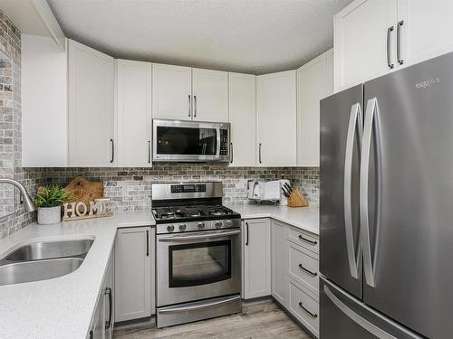 4604 43 Street, Beaumont, AB - Indoor Photo Showing Kitchen With Stainless Steel Kitchen With Double Sink With Upgraded Kitchen