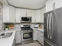 4604 43 Street, Beaumont, AB  - Indoor Photo Showing Kitchen With Stainless Steel Kitchen With Double Sink With Upgraded Kitchen 