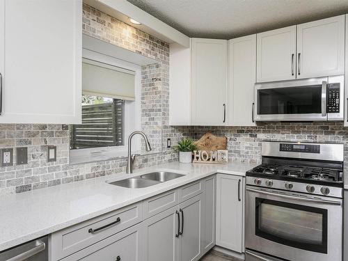 4604 43 Street, Beaumont, AB - Indoor Photo Showing Kitchen With Double Sink