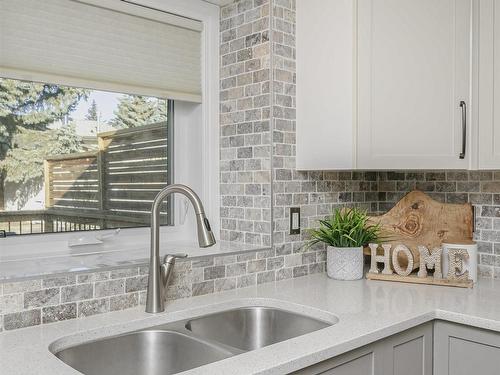 4604 43 Street, Beaumont, AB - Indoor Photo Showing Kitchen With Double Sink