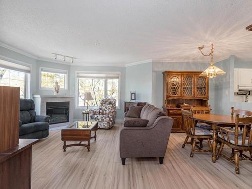 316 13450 114 Avenue, Edmonton, AB - Indoor Photo Showing Living Room With Fireplace