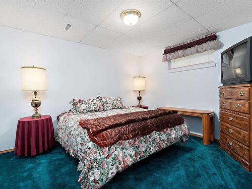 474062 A Highway 2A, Rural Wetaskiwin County, AB - Indoor Photo Showing Bedroom