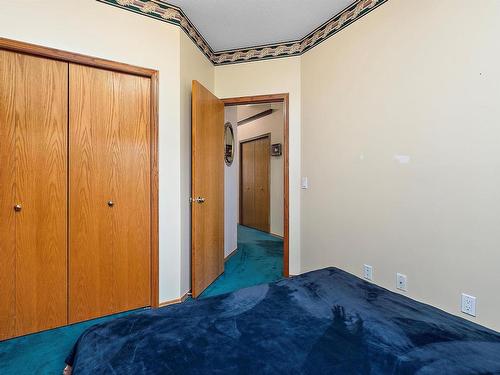 474062 A Highway 2A, Rural Wetaskiwin County, AB - Indoor Photo Showing Bedroom