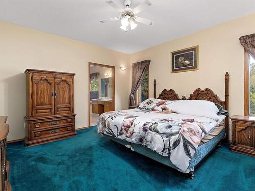 474062 A Highway 2A, Rural Wetaskiwin County, AB - Indoor Photo Showing Bedroom