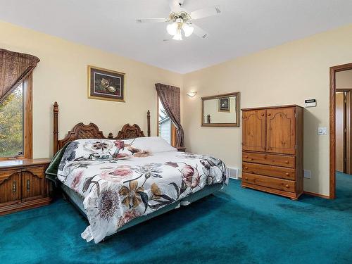 474062 A Highway 2A, Rural Wetaskiwin County, AB - Indoor Photo Showing Bedroom