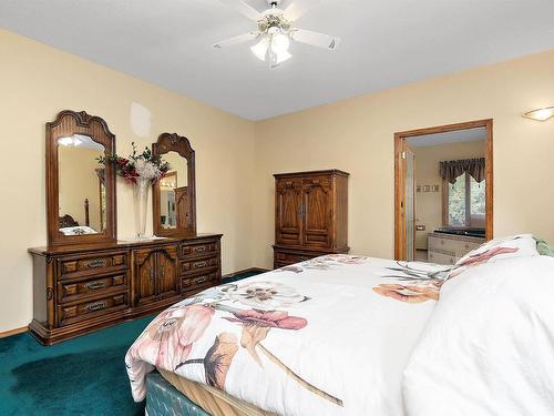 474062 A Highway 2A, Rural Wetaskiwin County, AB - Indoor Photo Showing Bedroom