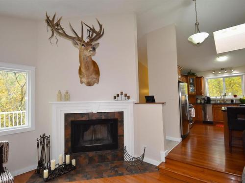 23 53301 Rge Road 32, Rural Parkland County, AB - Indoor Photo Showing Living Room With Fireplace