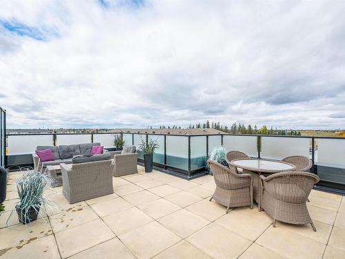 102 11080 Ellerslie Road, Edmonton, AB - Outdoor With Body Of Water