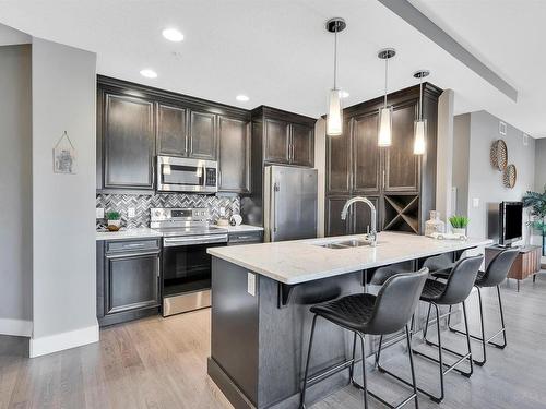 102 11080 Ellerslie Road, Edmonton, AB - Indoor Photo Showing Kitchen With Double Sink With Upgraded Kitchen