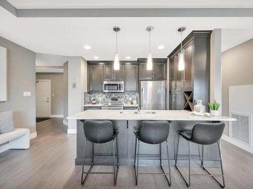 102 11080 Ellerslie Road, Edmonton, AB - Indoor Photo Showing Kitchen With Upgraded Kitchen