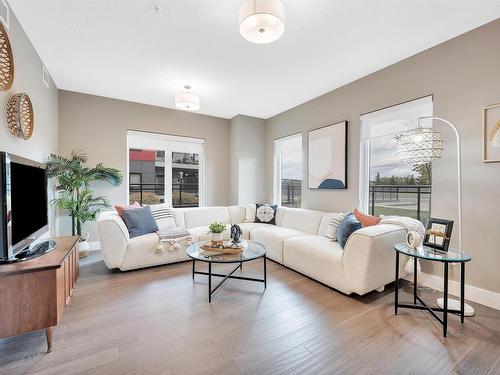 102 11080 Ellerslie Road, Edmonton, AB - Indoor Photo Showing Living Room