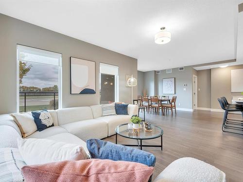 102 11080 Ellerslie Road, Edmonton, AB - Indoor Photo Showing Living Room