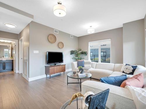 102 11080 Ellerslie Road, Edmonton, AB - Indoor Photo Showing Living Room