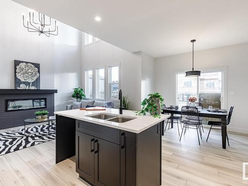 153 Rancher Road, Ardrossan, AB - Indoor Photo Showing Kitchen With Double Sink