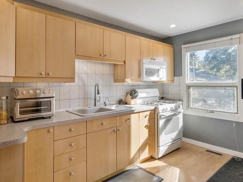 15745 106A Avenue, Edmonton, AB - Indoor Photo Showing Kitchen With Double Sink